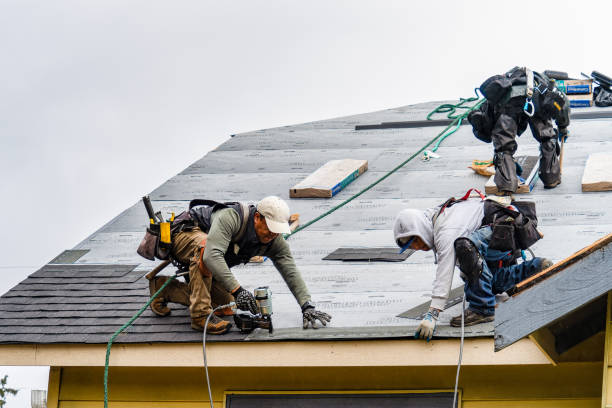 Professional Gutter Installation technician working in Brownstown, IN